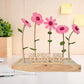 Happy Blooms met vilten bloemen in roze en houten bordje 'Je bent een topper'. 